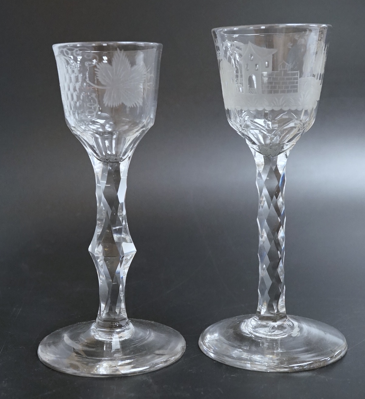 Two faceted wine glasses, c.1780, both with engraved bowls, tallest 15.5cm